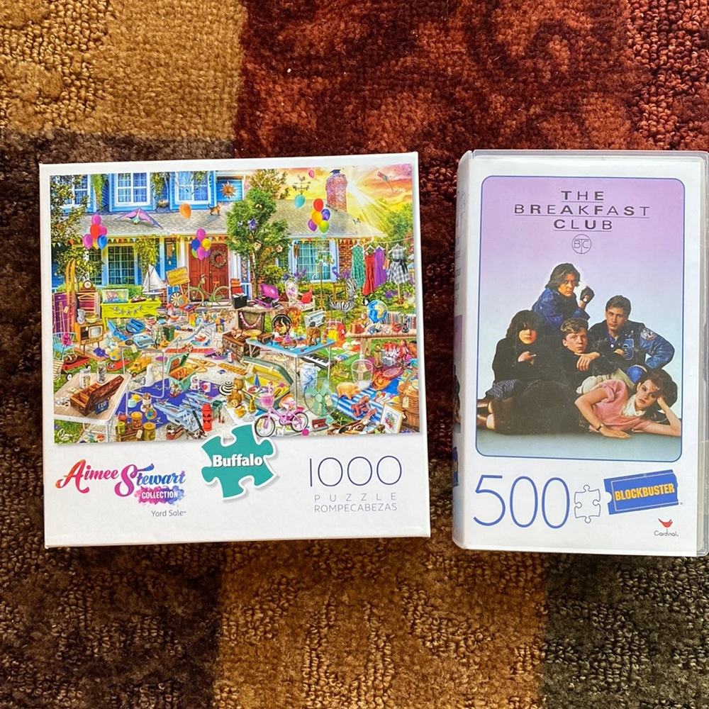 2 PUZZLES. YARD SALE PUT TOGETHER 1X. BREAKFAST CLUB IS NEW. NEVER OPENED.